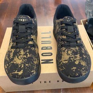 NOBULL women’s size 7.5 gold Pride trainers.